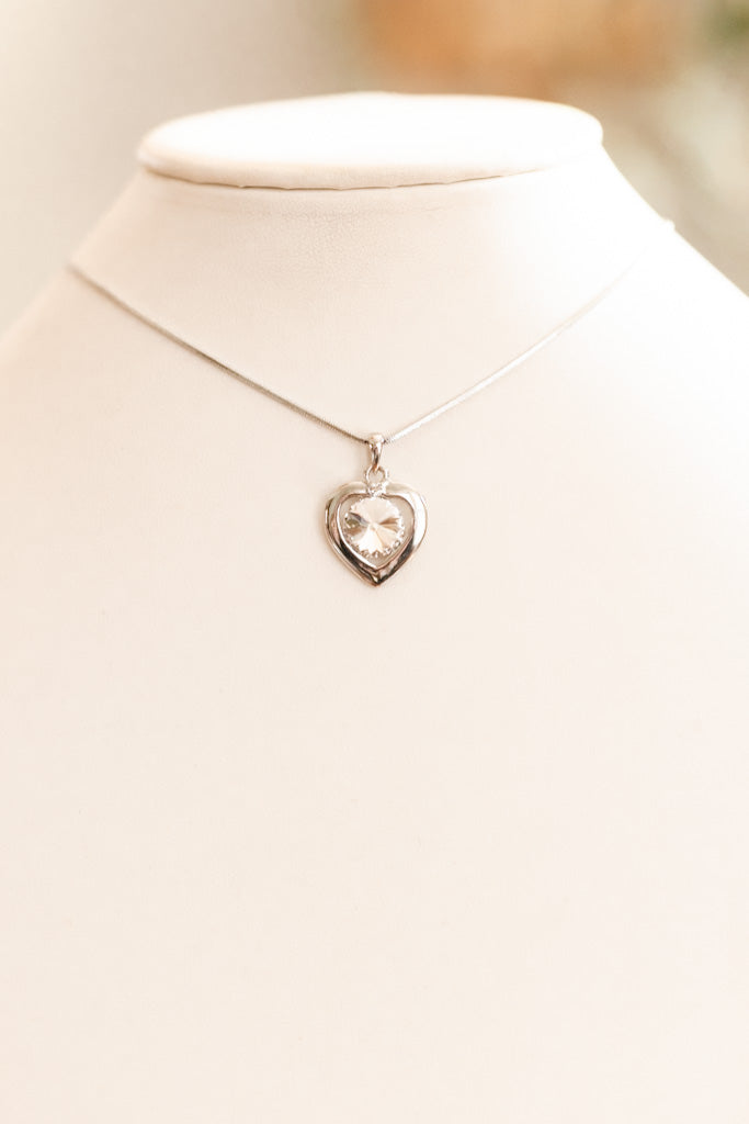 Round Stone Floating in Metal Heart Necklace