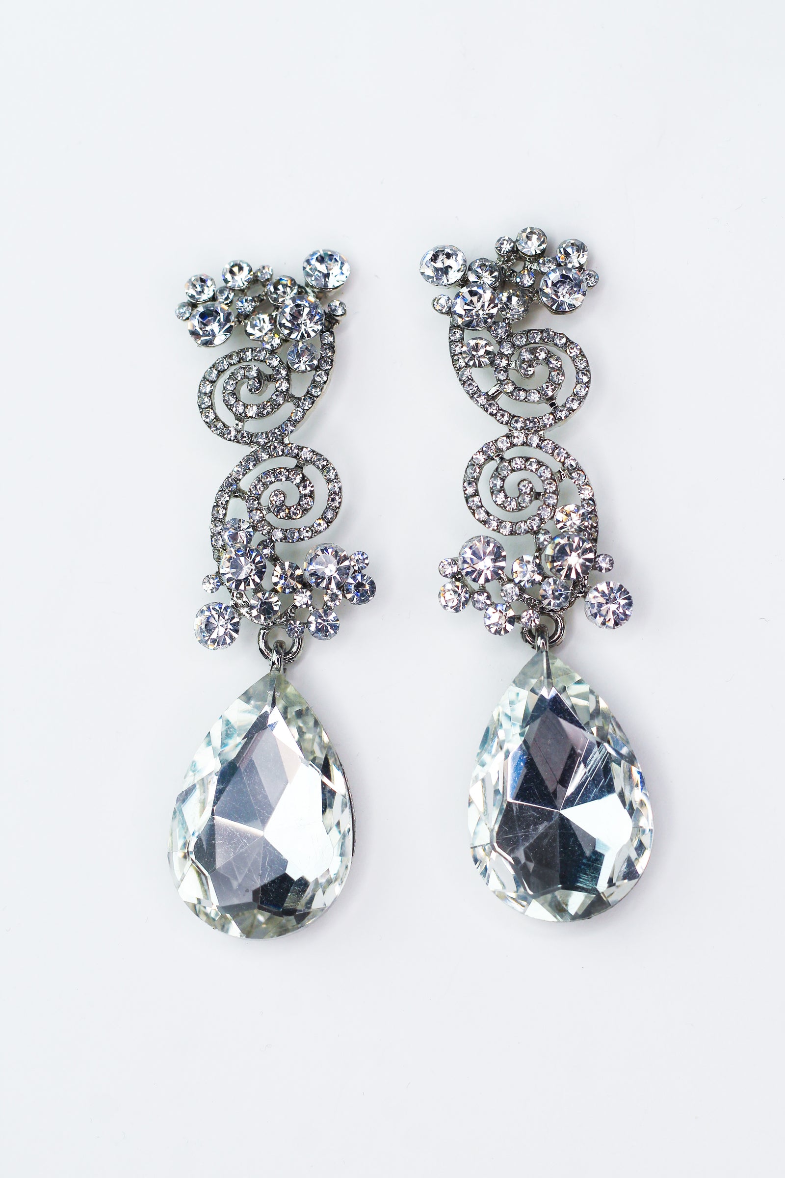Double Swirl Top Teardrop Bottom Rhinestone Earrings