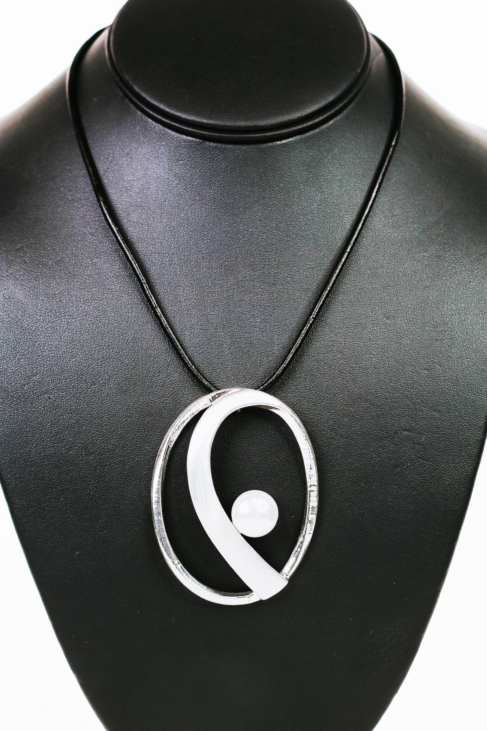 Large Open Circle Wave Across & Pearl Necklace