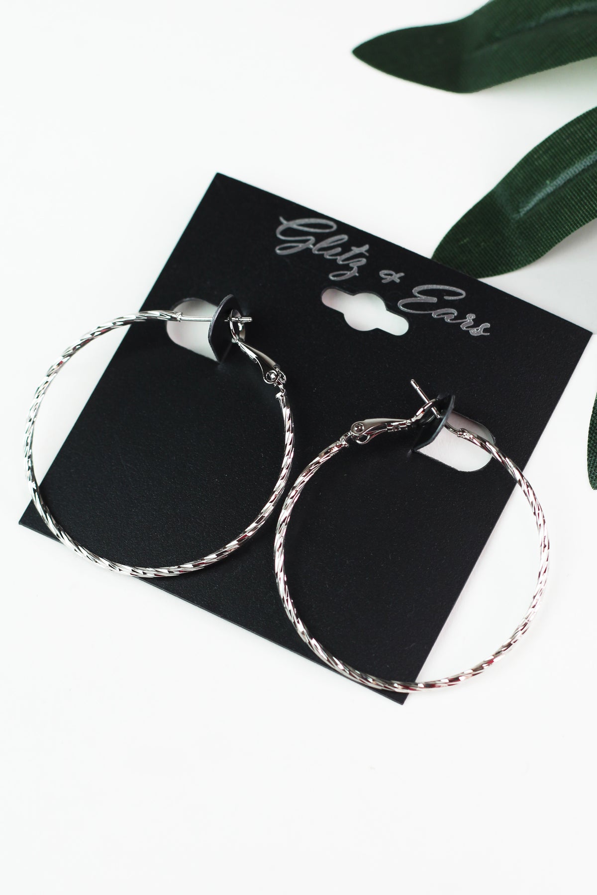 Thin Twisted Metal Lever Back Hoop Earrings
