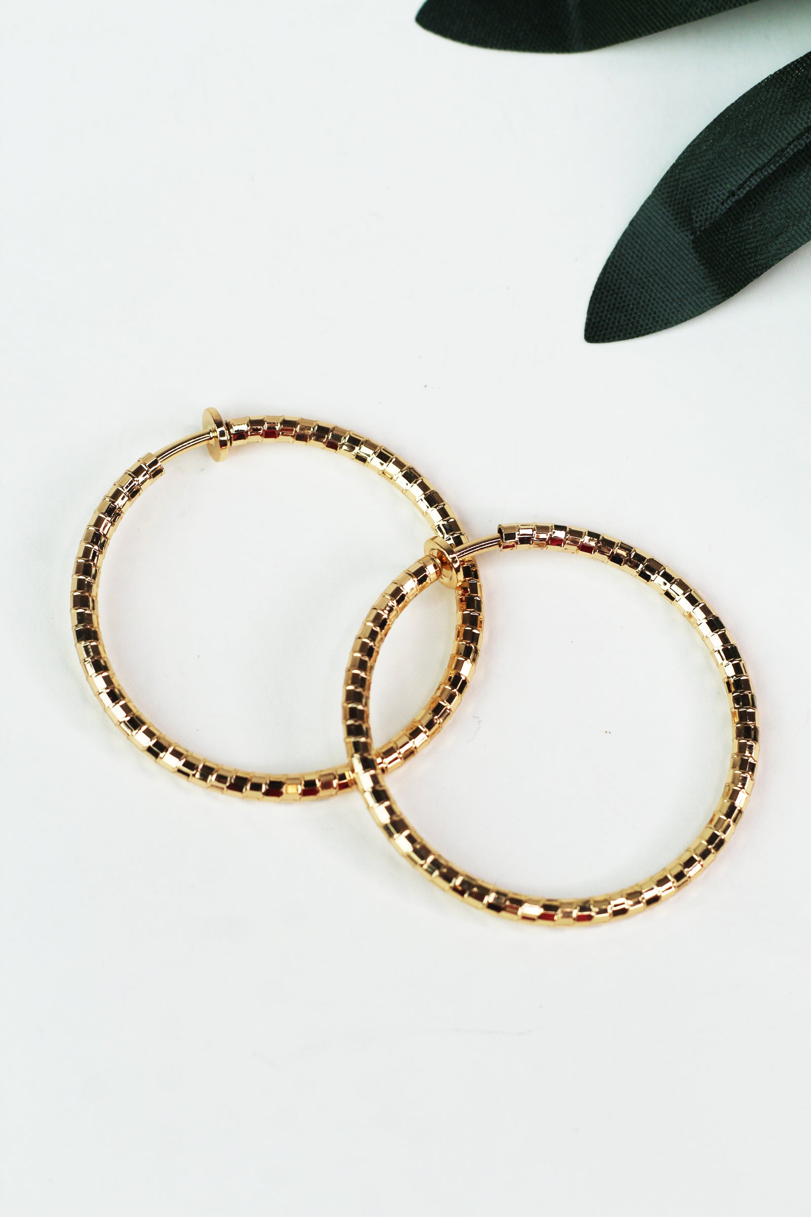 Medium Textured Metal Clip On Hoop Earrings