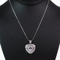 SS Baguette Trimmed Pave Heart w/ Raised Center Stone Necklace