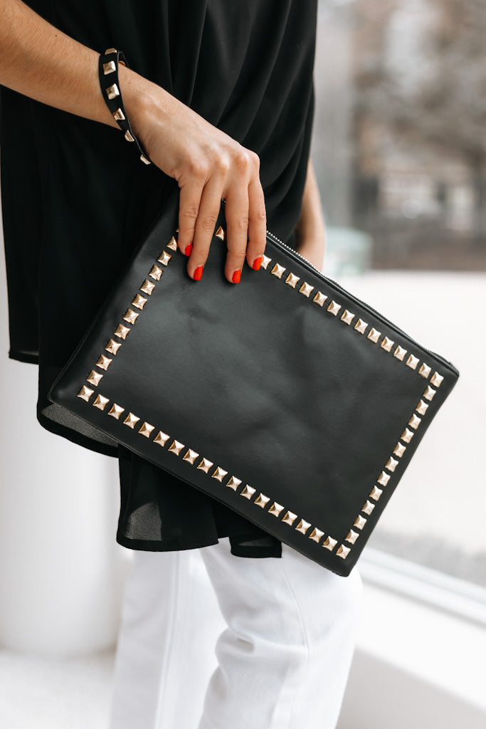 Buy the The Sak Black Leather Clutch Purse | GoodwillFinds