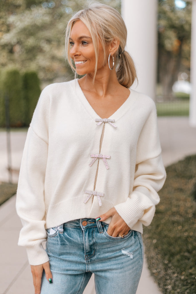 Three Rhinestone Bow V-Neck Sweater