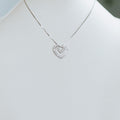 Two Overlapping Pave Heart Necklace