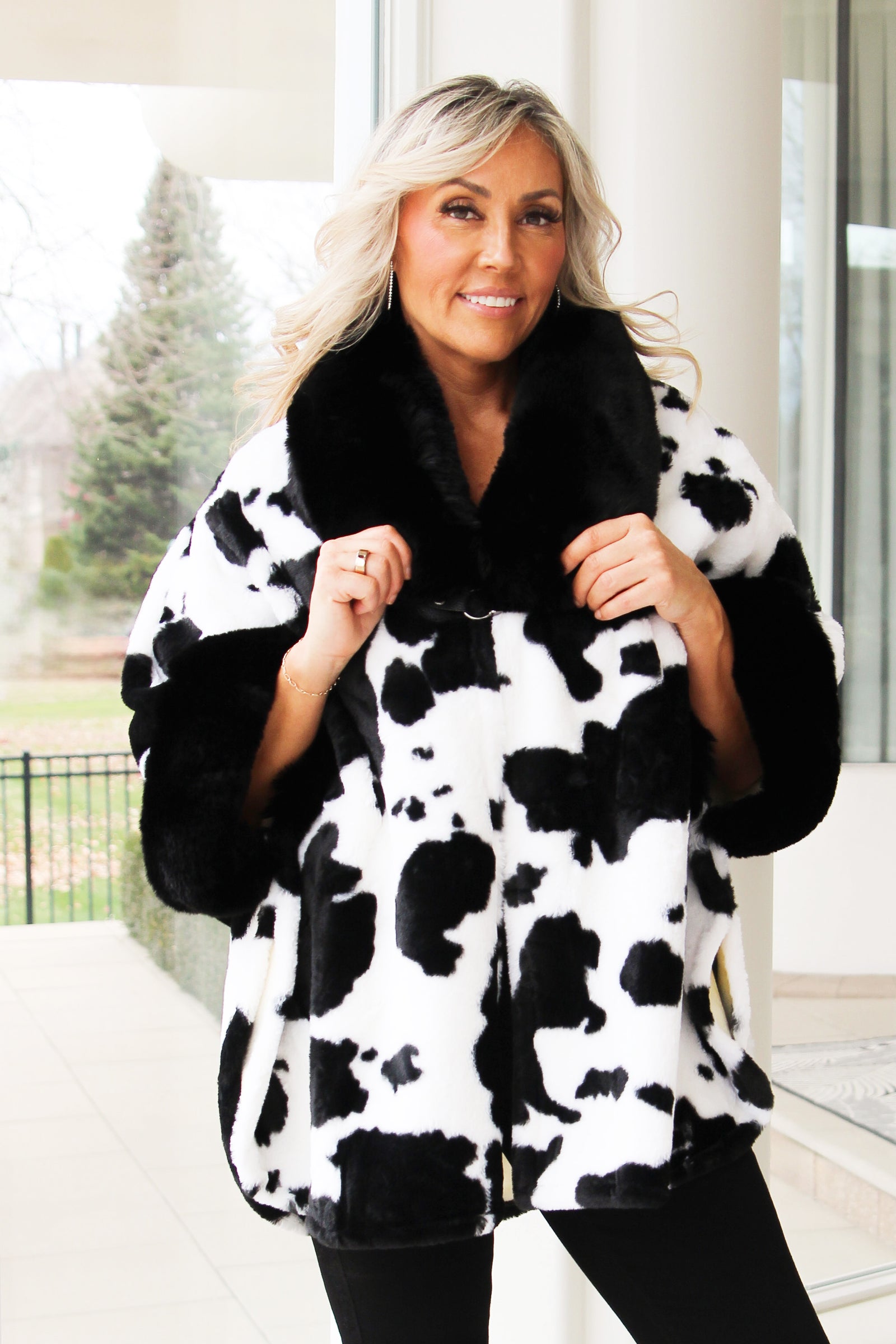 Faux Fur Trimmed Hooded Cow Print Poncho