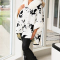 Faux Fur Trimmed Hooded Cow Print Poncho