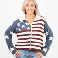 Woman wearing a cardigan with an American flag pattern on a white background