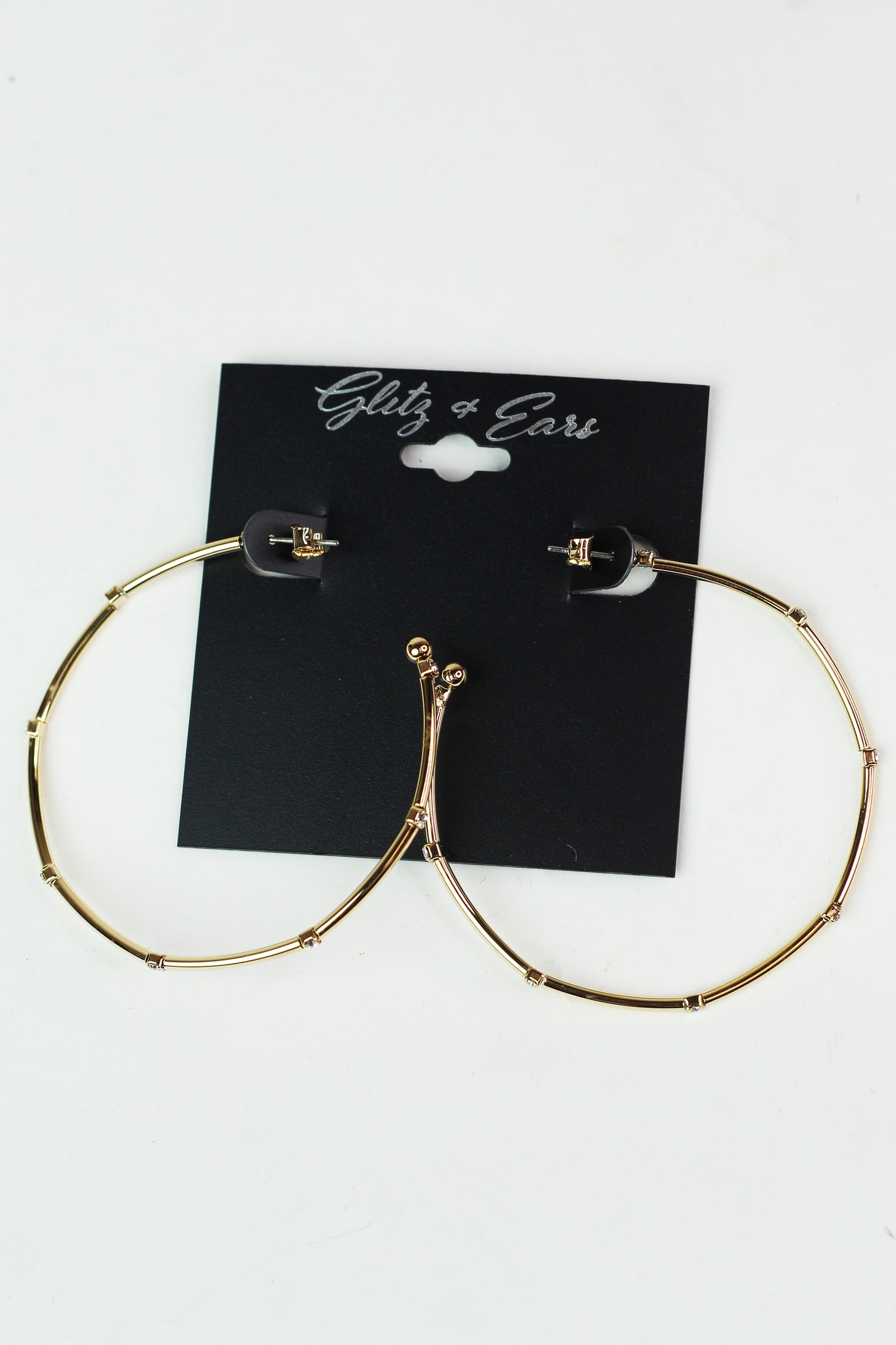 Metal Row Spaced Stone Alternate Medium Hoop
