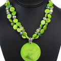 Two Strand Beaded Necklace w/ Round Shell Pendant