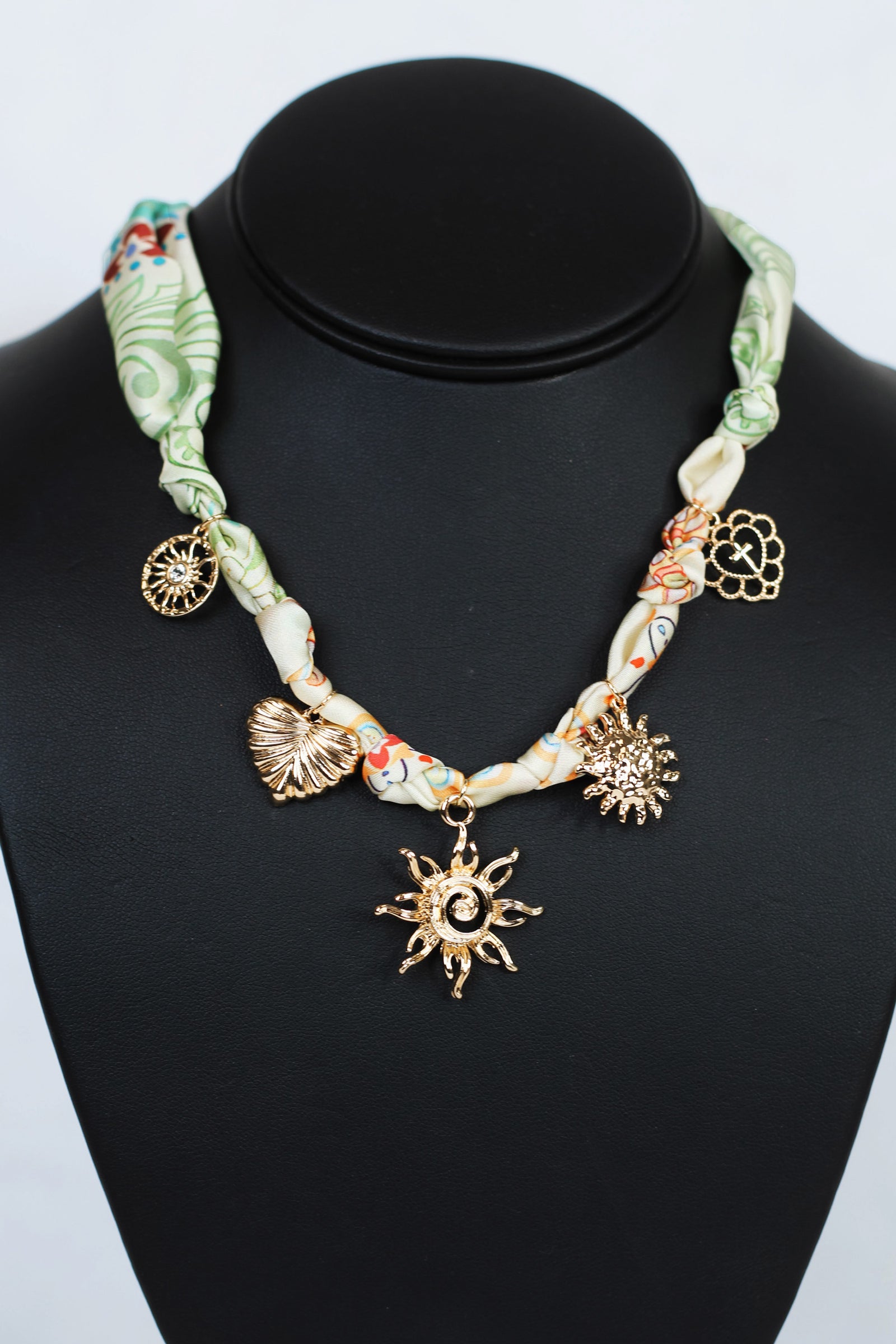 Knotted Silky Fabric w/ Sun & Various Charms Necklace