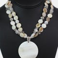 Two Strand Beaded Necklace w/ Round Shell Pendant