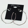 Metal Row Spaced Stone Alternate Medium Hoop