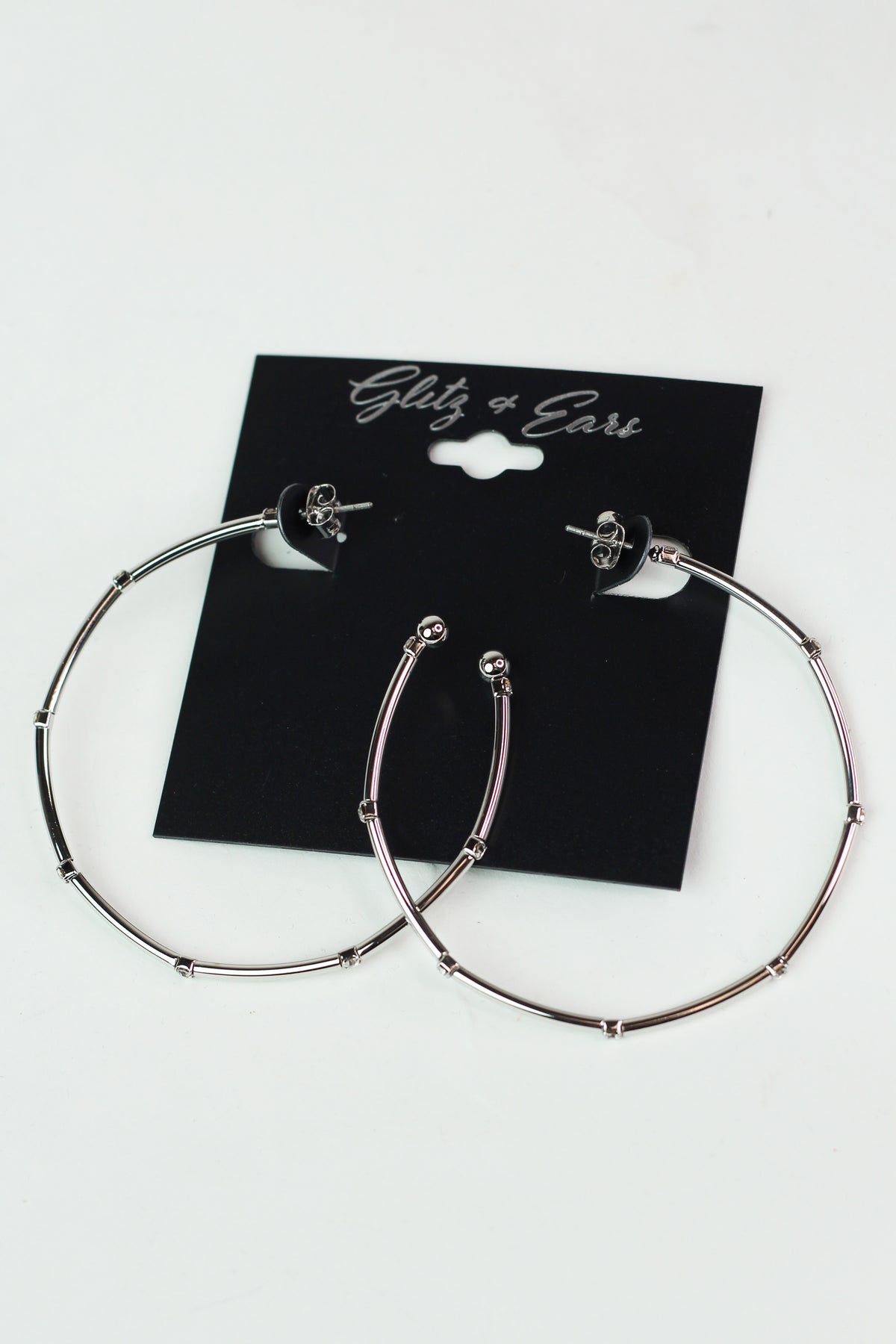Metal Row Spaced Stone Alternate Medium Hoop