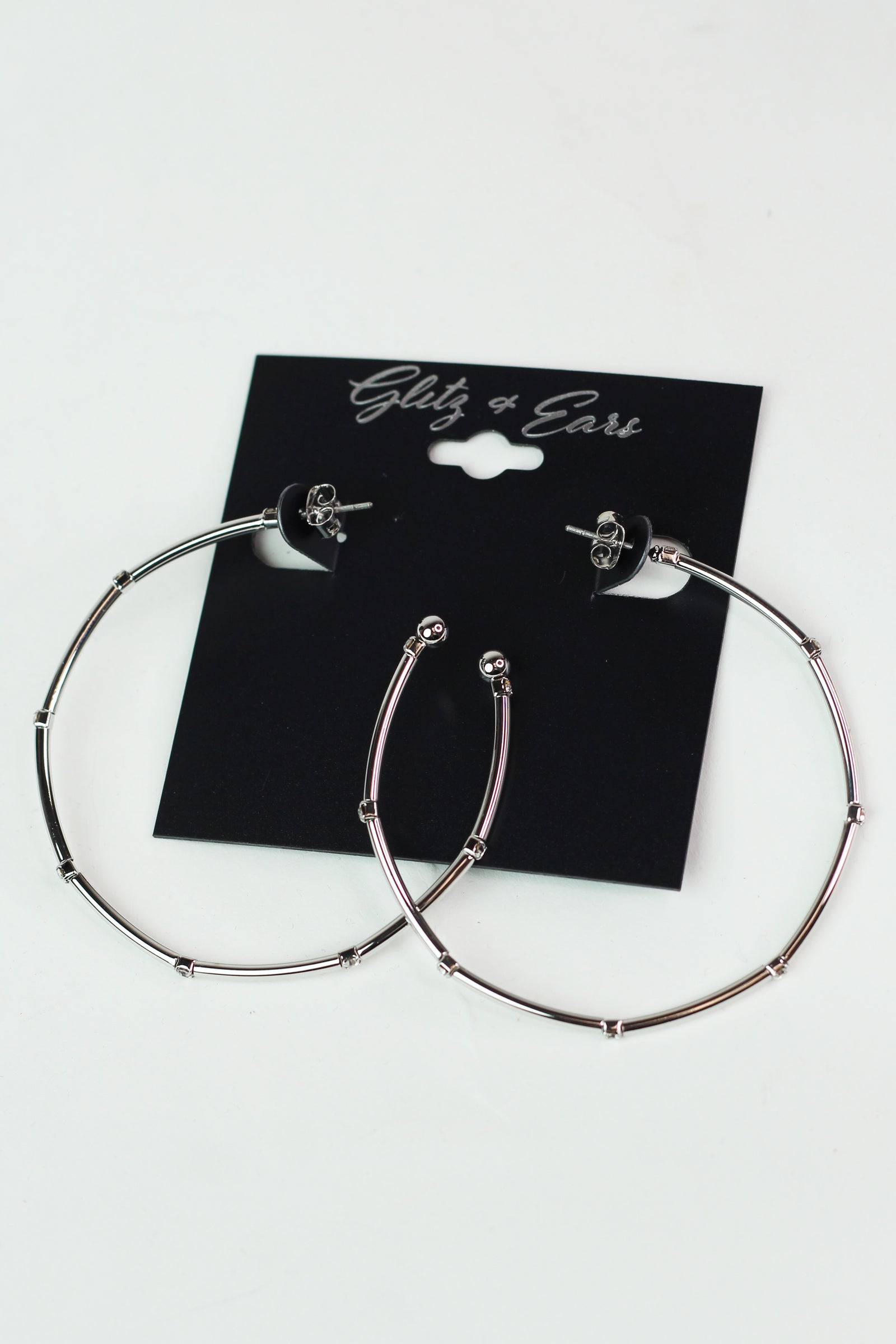 Metal Row Spaced Stone Alternate Medium Hoop