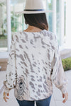 Round Neck Animal Print Distressed Sweater