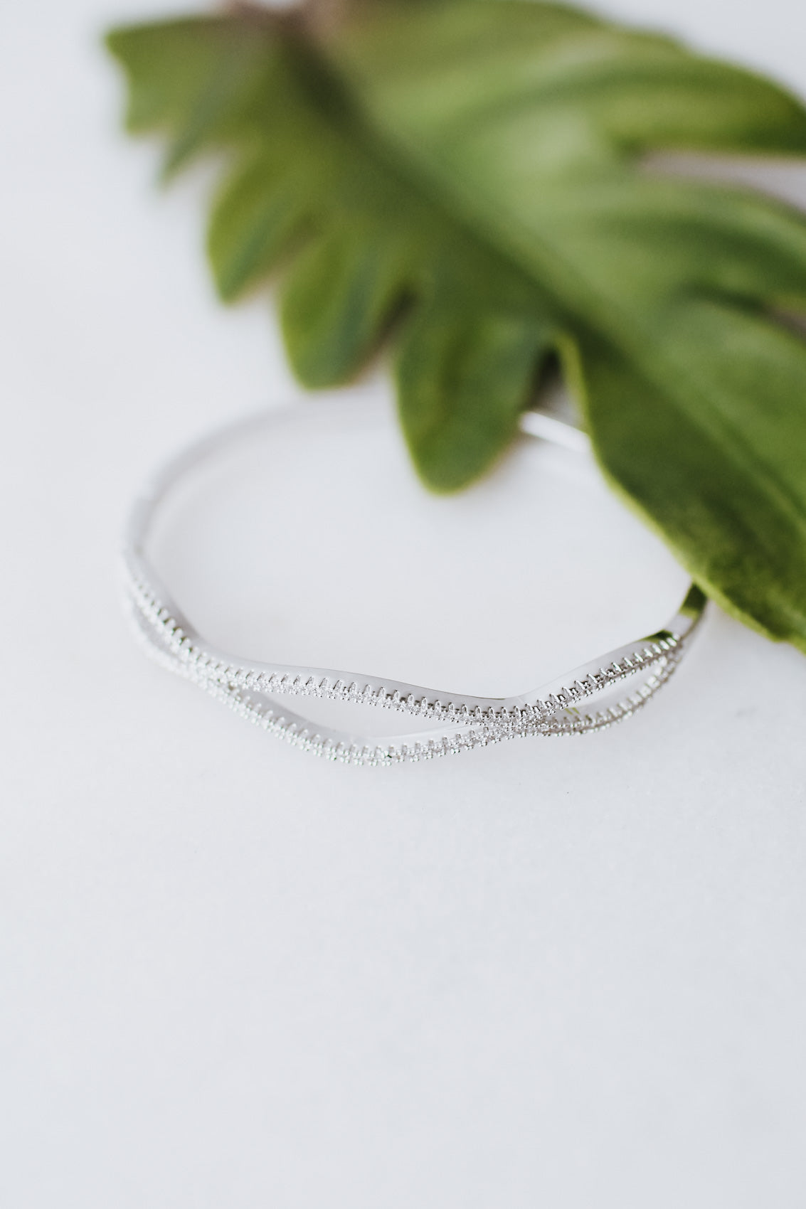 Two Row Spaced Wave Pave Bangle